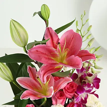 Elegant Mixed Flowers In Cylindrical Vase | Cake2homes