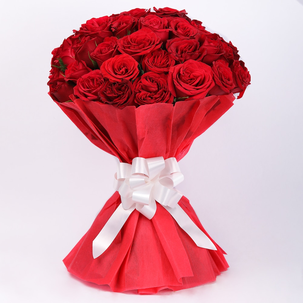 For Someone Special Red Roses In Red Packing | Cake2homes