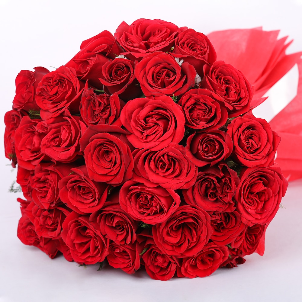 For Someone Special Red Roses In Red Packing | Cake2homes