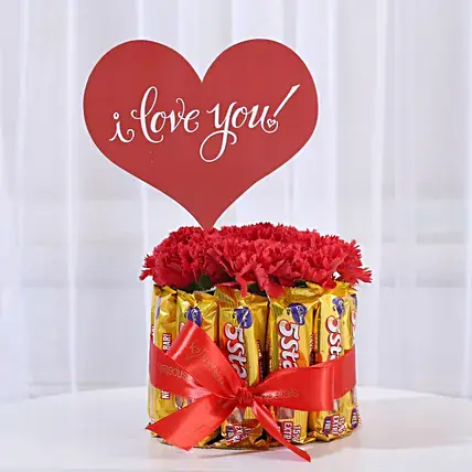 Carnations in Glass Vase & 5 Star Chocolate Bouquet Carnations in Glass Vase & 5 Star Chocolate Bouquet