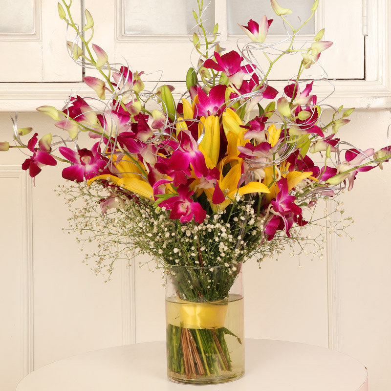Orchids In A Vase