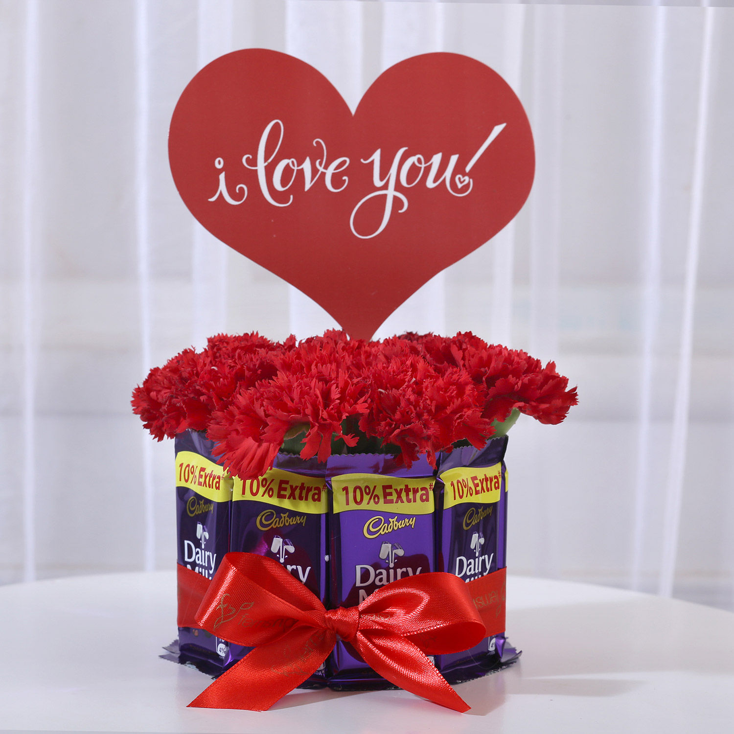 Carnations in Glass Vase & Dairy Milk Chocolate Bouquet