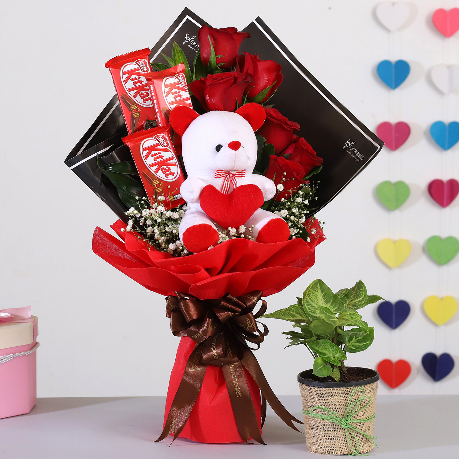 Red Roses Bouquet With Syngonium Plant & Kitkat Red Roses Bouquet With Syngonium Plant & Kitkat
