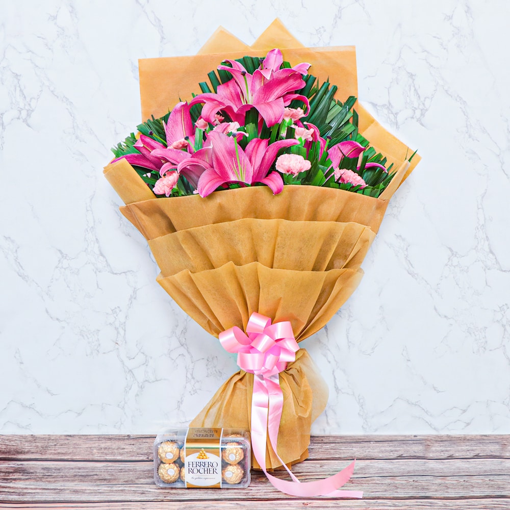 Classy Ferrero Lilies N Carnation Bouquet