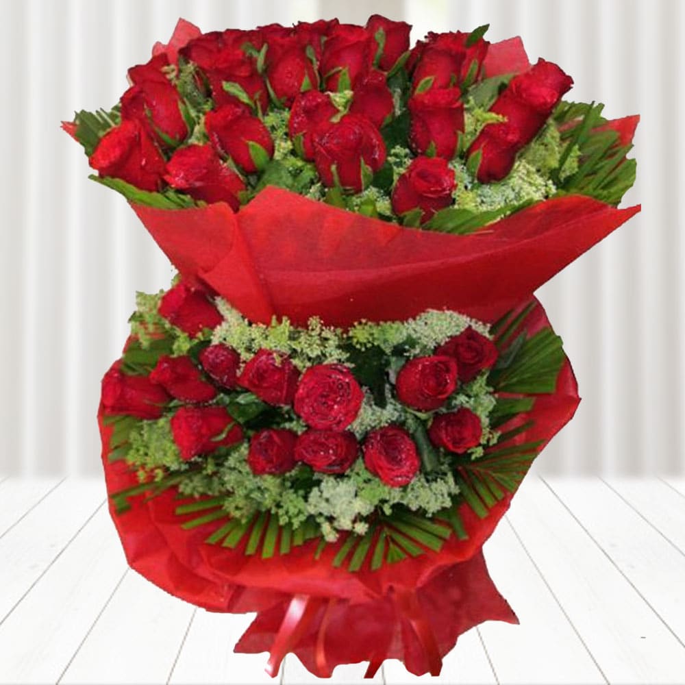 Red Roses In Two Tier With Red Packing Red Roses In Two Tier With Red Packing