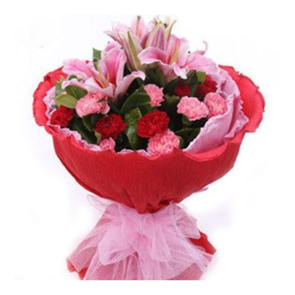 Red And Pink Carnations With Pink Lilies In Red Packing